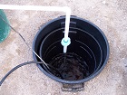 Water running through nutrient reservoir cooling system