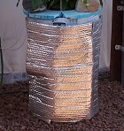 Insulation wrapped around DWC bucket to keep nutrient solution cool